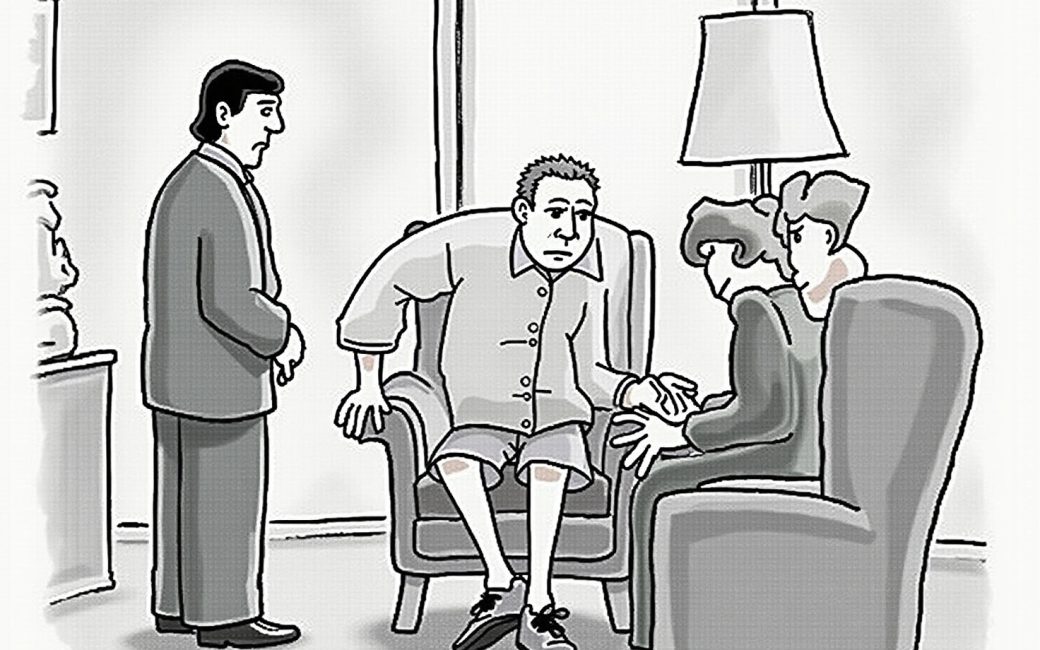 Older person being helped up from a chair by a concerned family member in a home setting